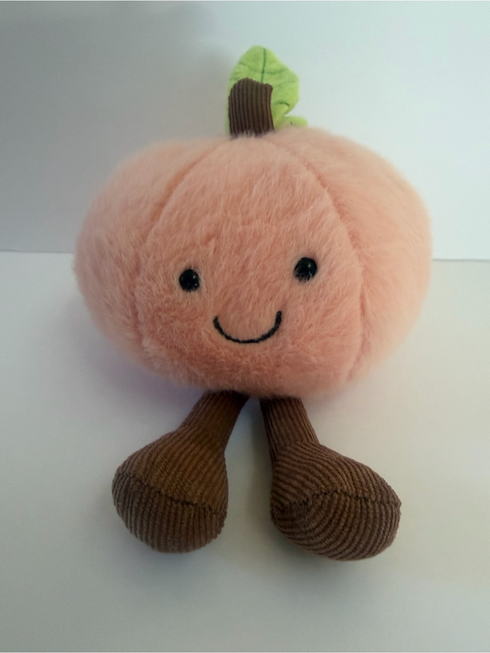 Adorable Fuzzy Peach Plush